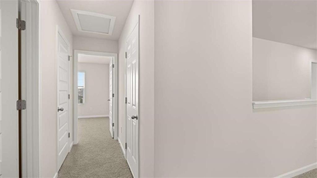 438 Abbott Road Statham, GA 30666 - Photo 31 of 56 a view of a bathroom from the hallway