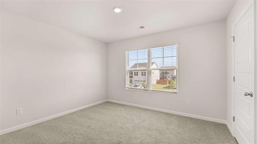 438 Abbott Road Statham, GA 30666 - Photo 35 of 56 an empty room with a window