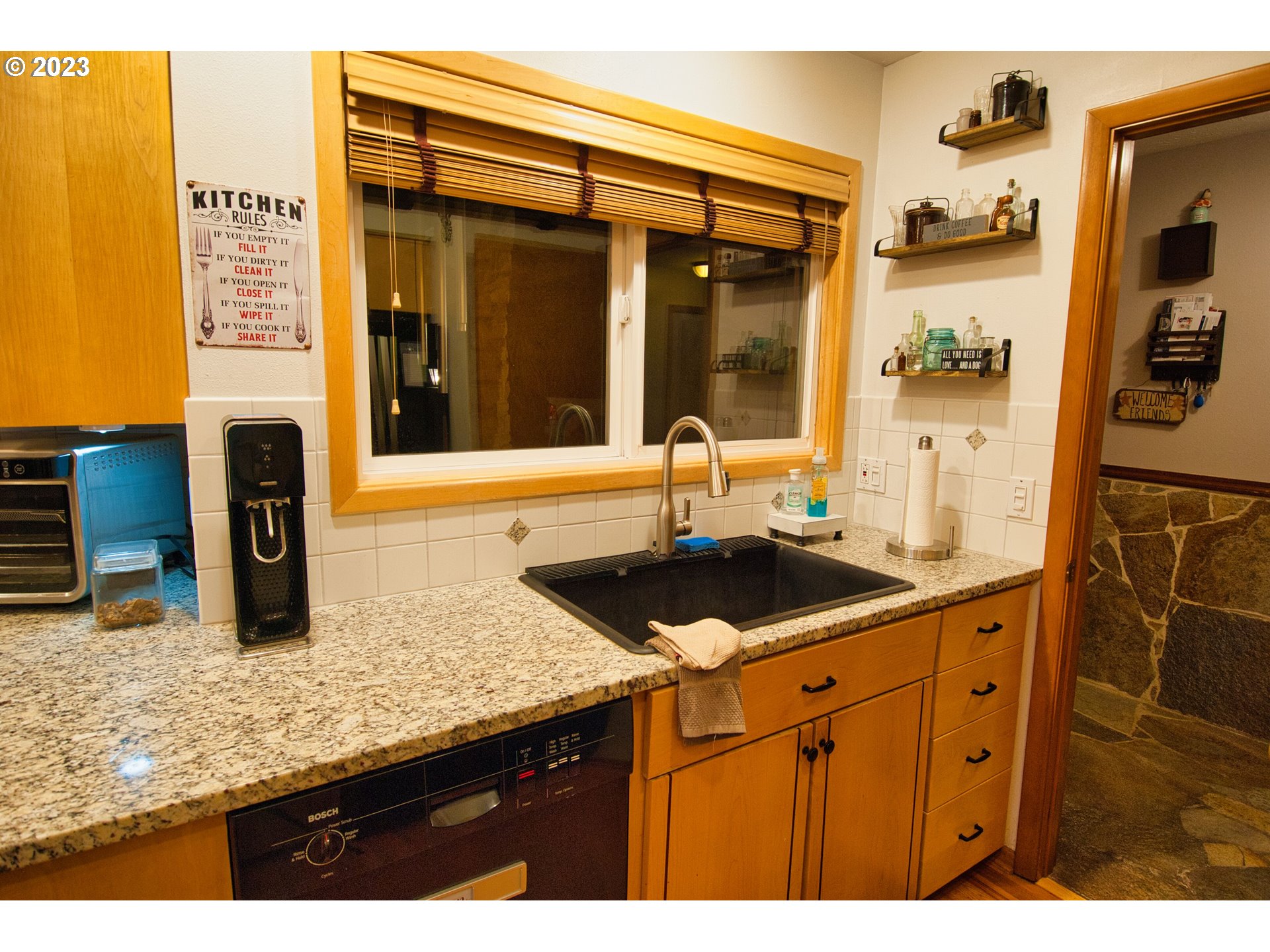 8181 Labish Center Road Northeast Silverton, OR 97381 - Photo 15 of 43 a kitchen with sink and mirror
