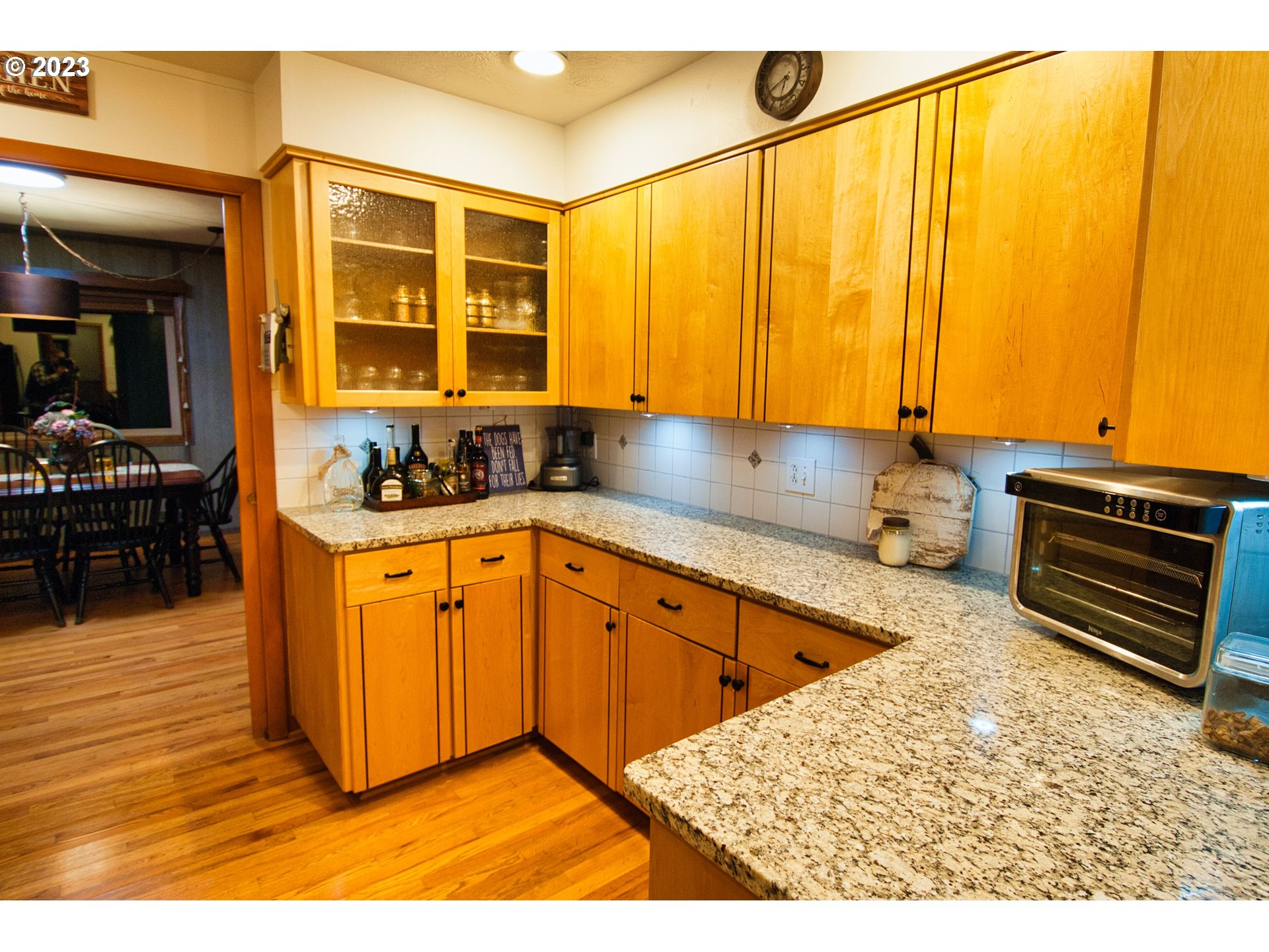 8181 Labish Center Road Northeast Silverton, OR 97381 - Photo 16 of 43 a kitchen with stainless steel appliances granite countertop a sink a stove and a refrigerator