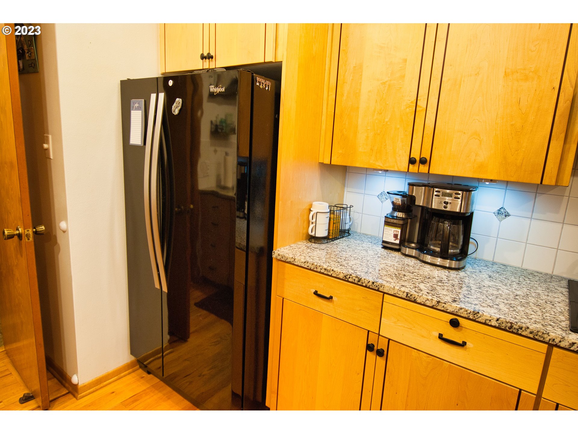 8181 Labish Center Road Northeast Silverton, OR 97381 - Photo 19 of 43 a kitchen with stainless steel appliances granite countertop a refrigerator and a sink