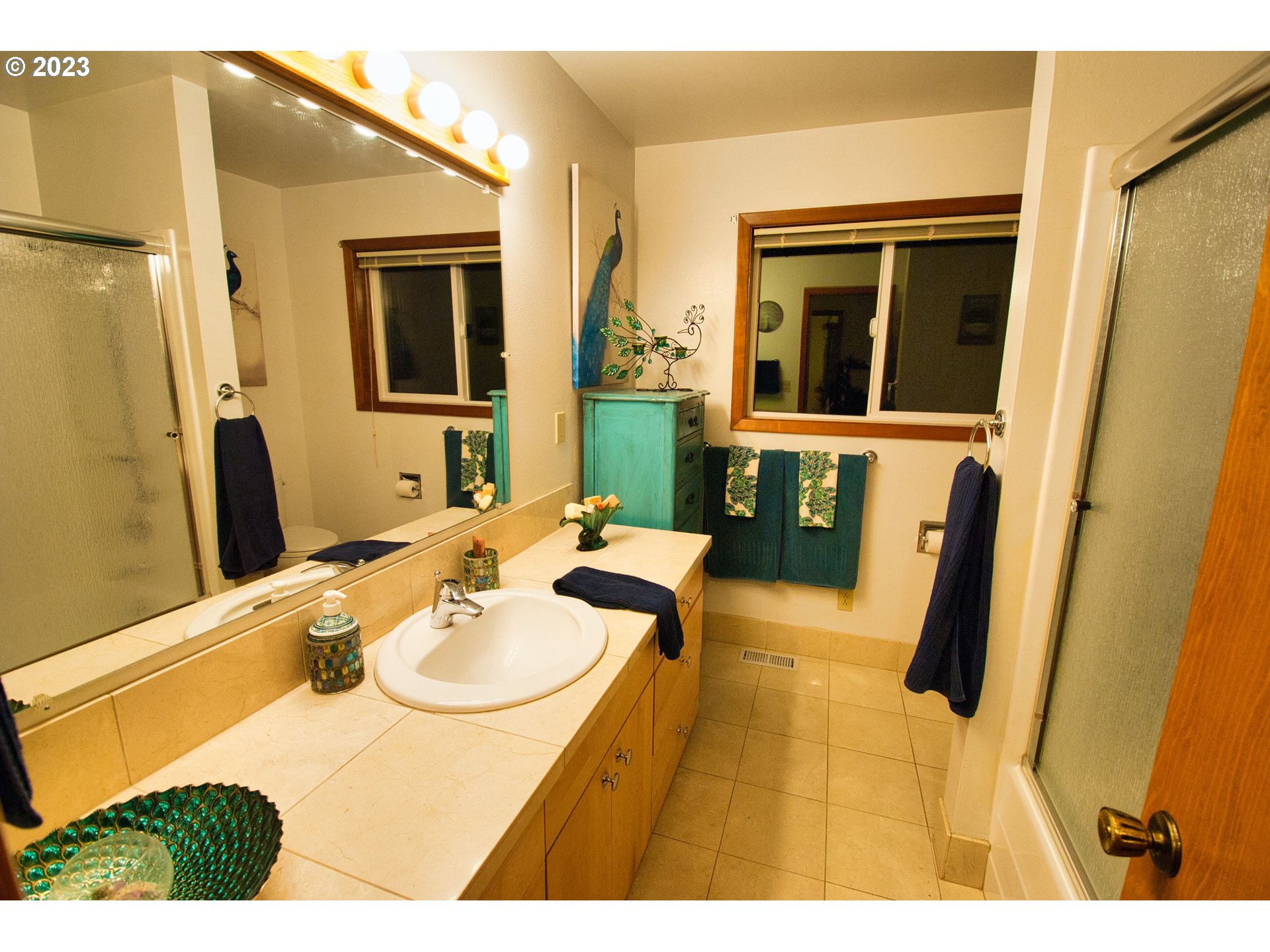 8181 Labish Center Road Northeast Silverton, OR 97381 - Photo 35 of 43 a bathroom with a sink and a mirror
