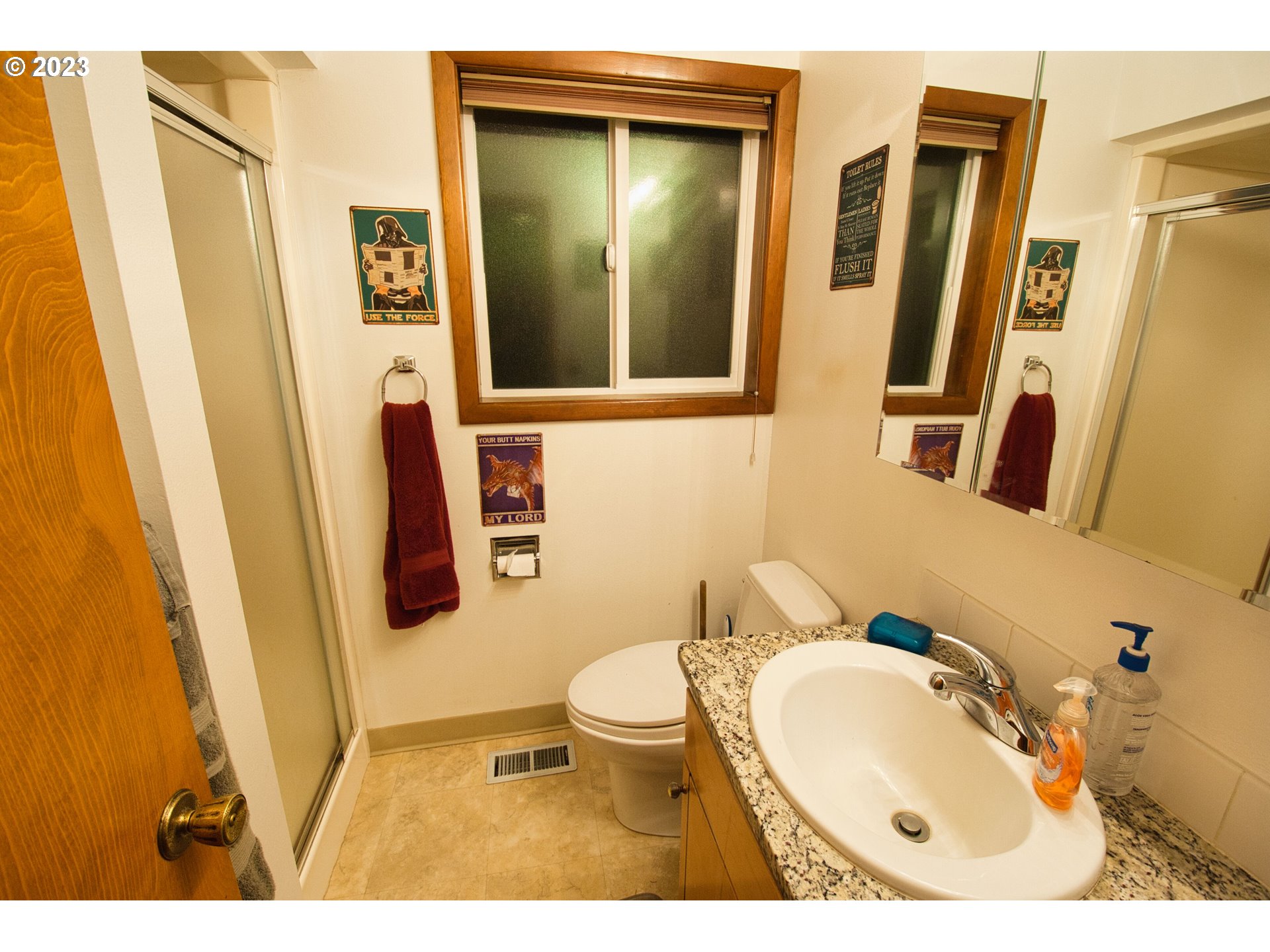 8181 Labish Center Road Northeast Silverton, OR 97381 - Photo 39 of 43 a bathroom with a sink and mirror with toilet