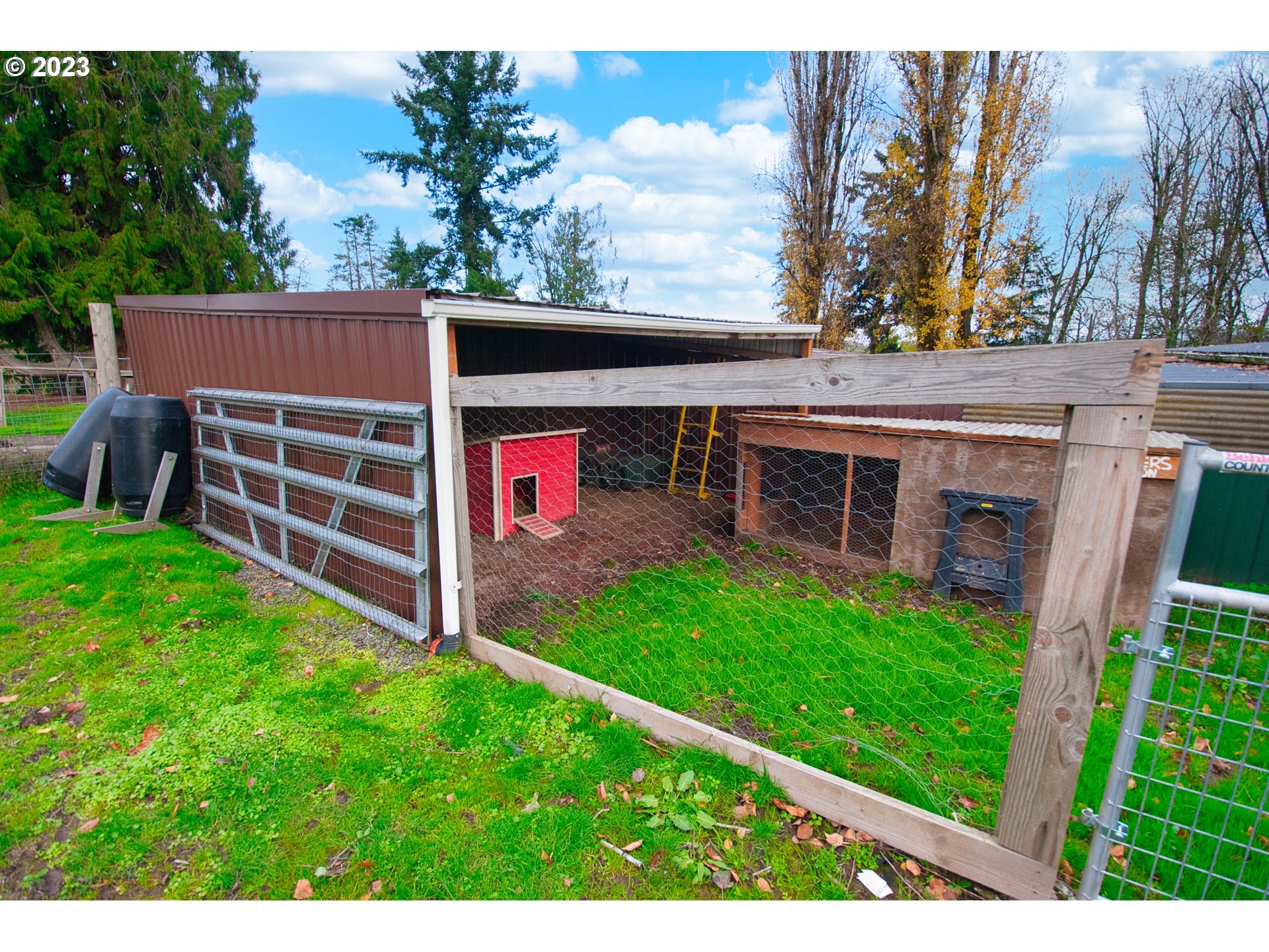 8181 Labish Center Road Northeast Silverton, OR 97381 - Photo 42 of 43 a view of an house with backyard porch and furniture