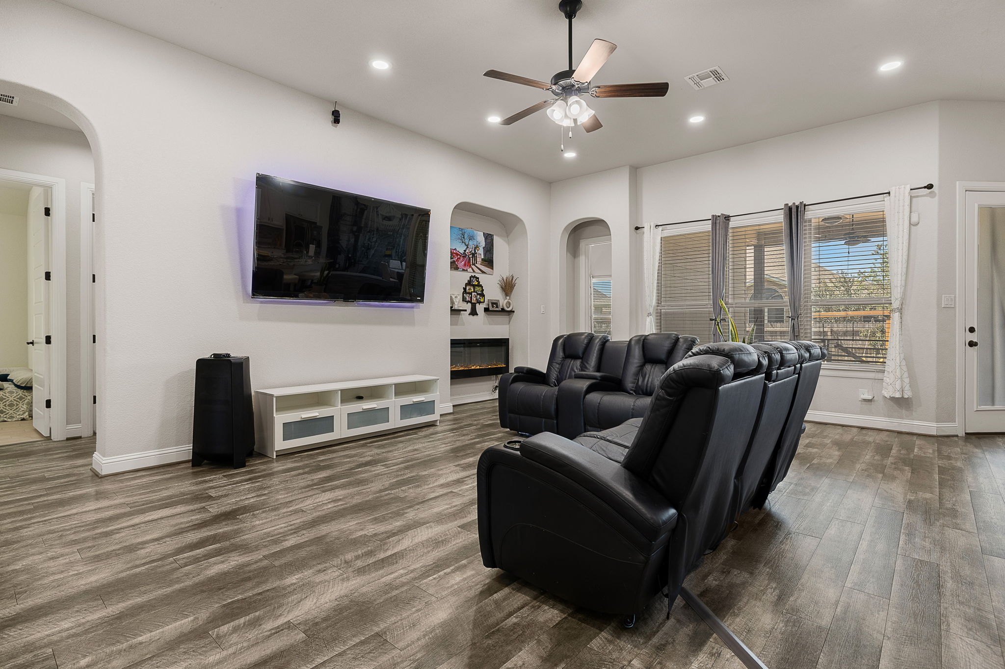 3517 Tree Swallow Way Pflugerville, TX 78660 - Photo 5 of 32 Recessed lighting and warm wood flooring define this large designed for multiple layouts.
