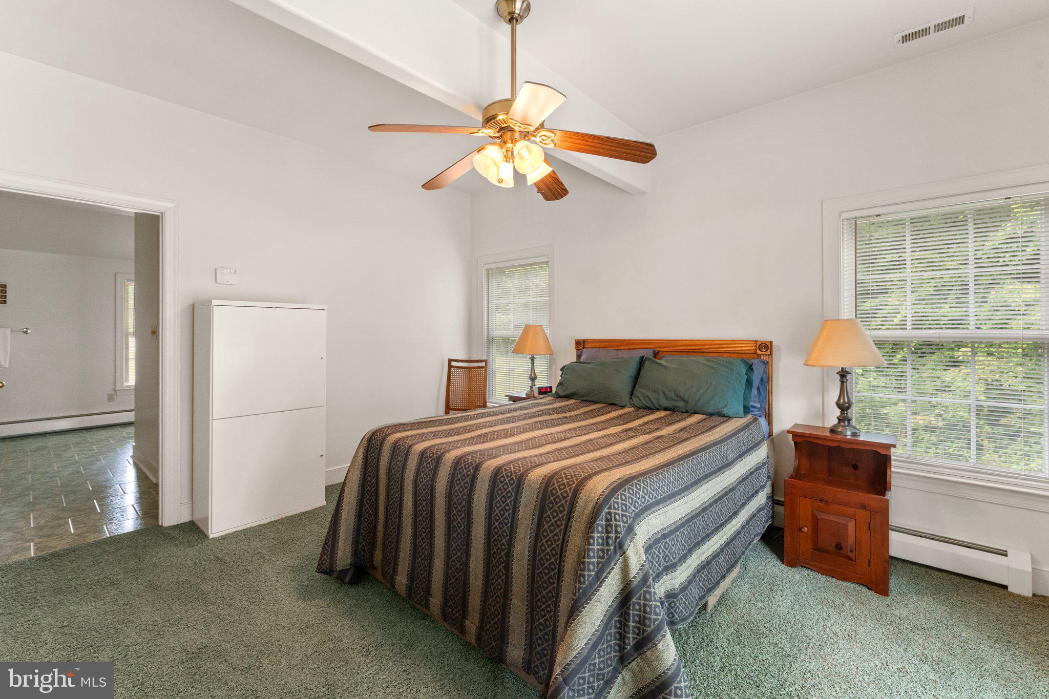 367 Edgewater Lane Montross, VA 22520 - Photo 20 of 60 Primary bedroom suite with sliding doors to deck