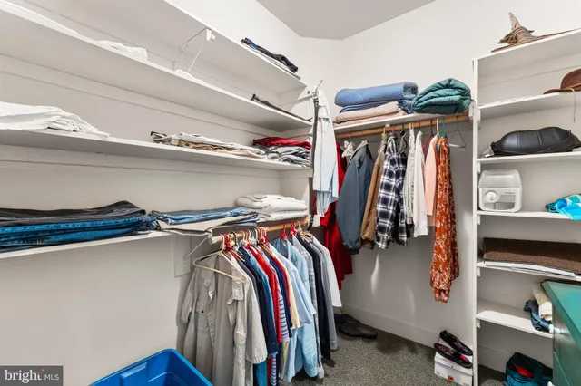 a bathroom with a sink a vanity and a mirror