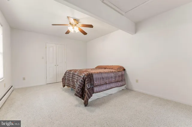 a view of a chairs and table in the patio