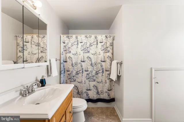 a view of wooden deck and a yard