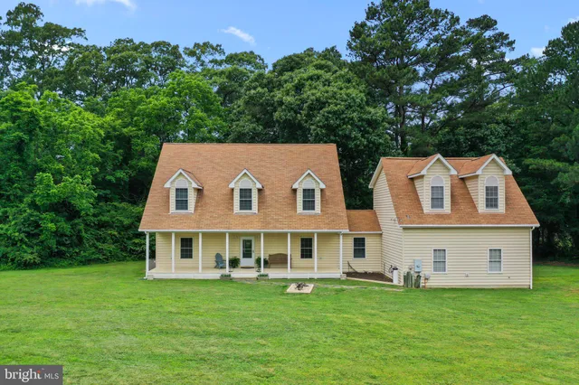 a aerial view of a house with a garden