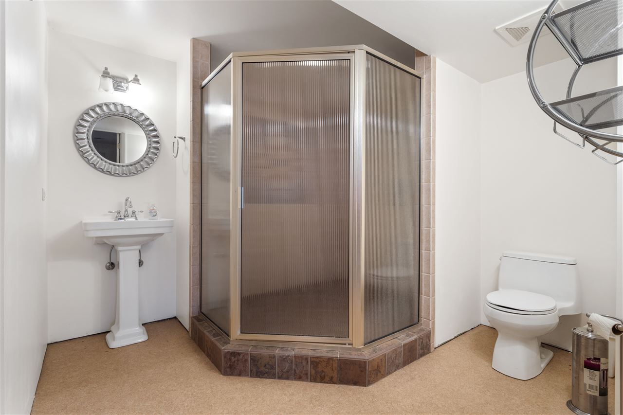 10417 Fruit Farm Road Garden Prairie, IL 61038 - Photo 18 of 25 a bathroom with a toilet and a mirror