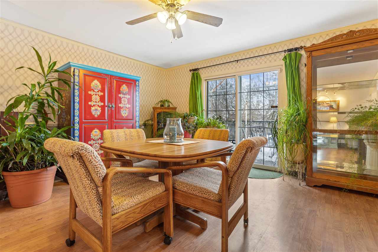 10417 Fruit Farm Road Garden Prairie, IL 61038 - Photo 10 of 25 a view of a dining room with furniture window and outside view