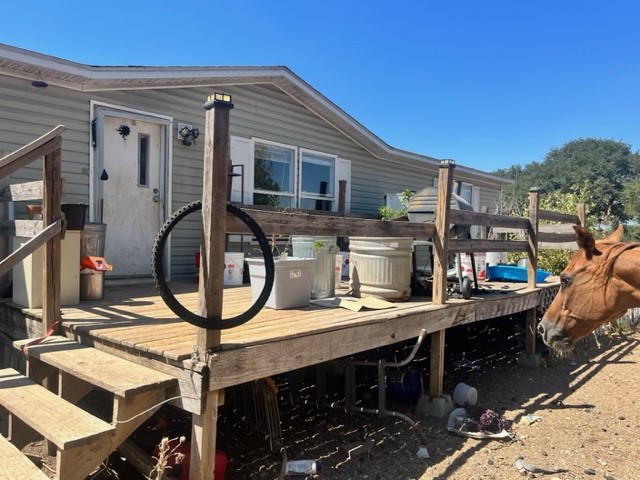 a view of a chairs and table in a patio