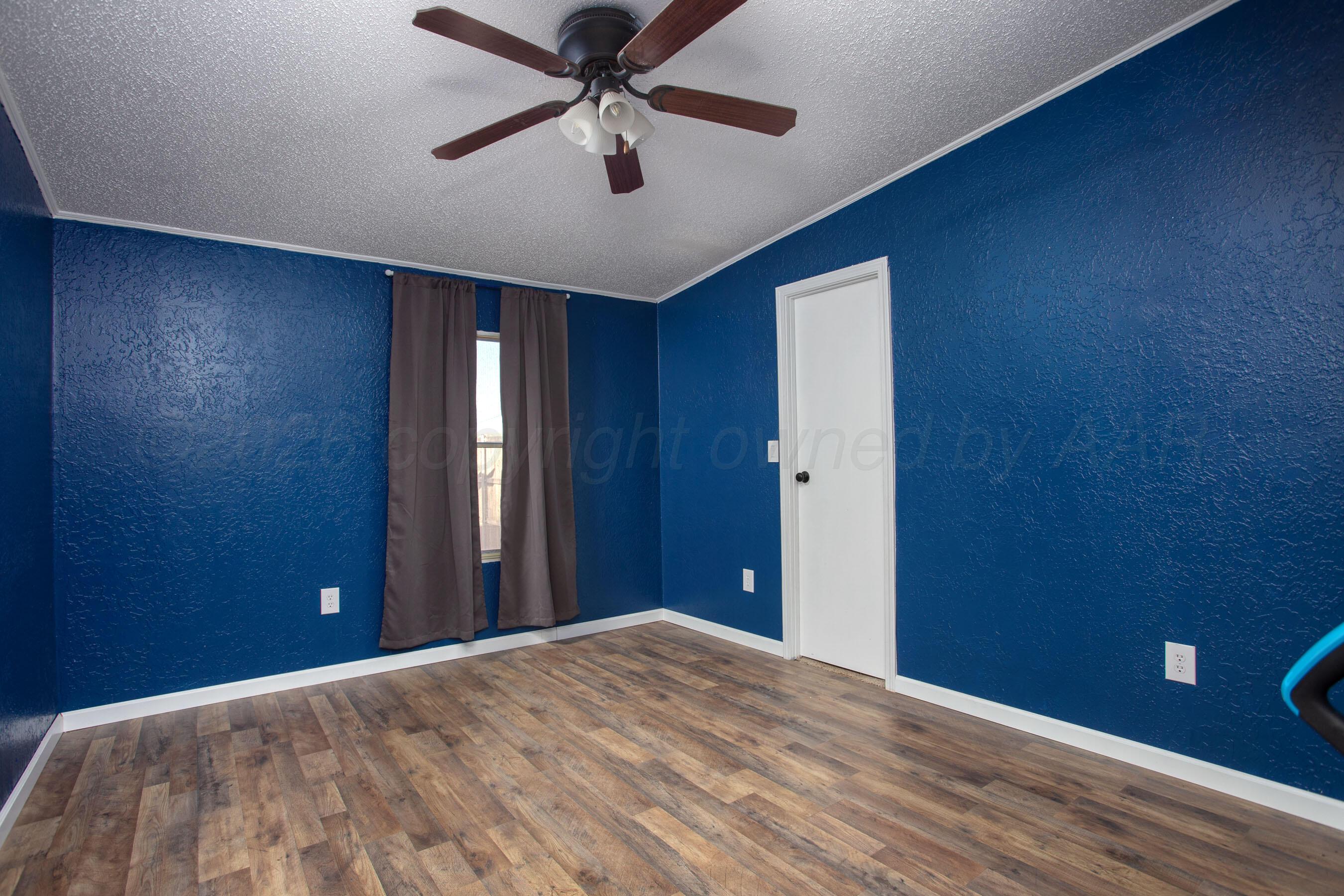 9707 Strawman Trail Amarillo, TX 79108 - Photo 18 of 32 Bedroom 3