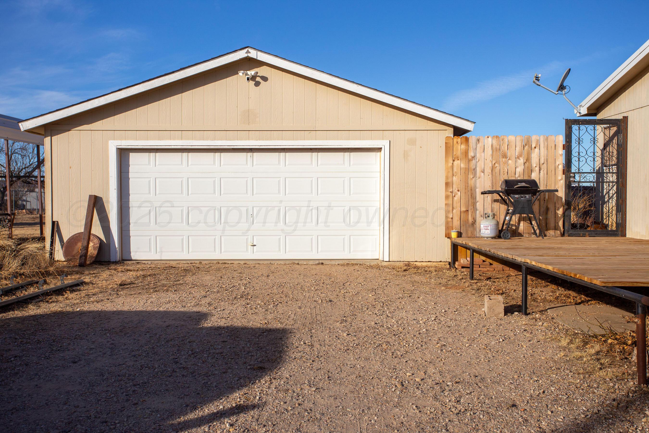 9707 Strawman Trail Amarillo, TX 79108 - Photo 25 of 32 Garage