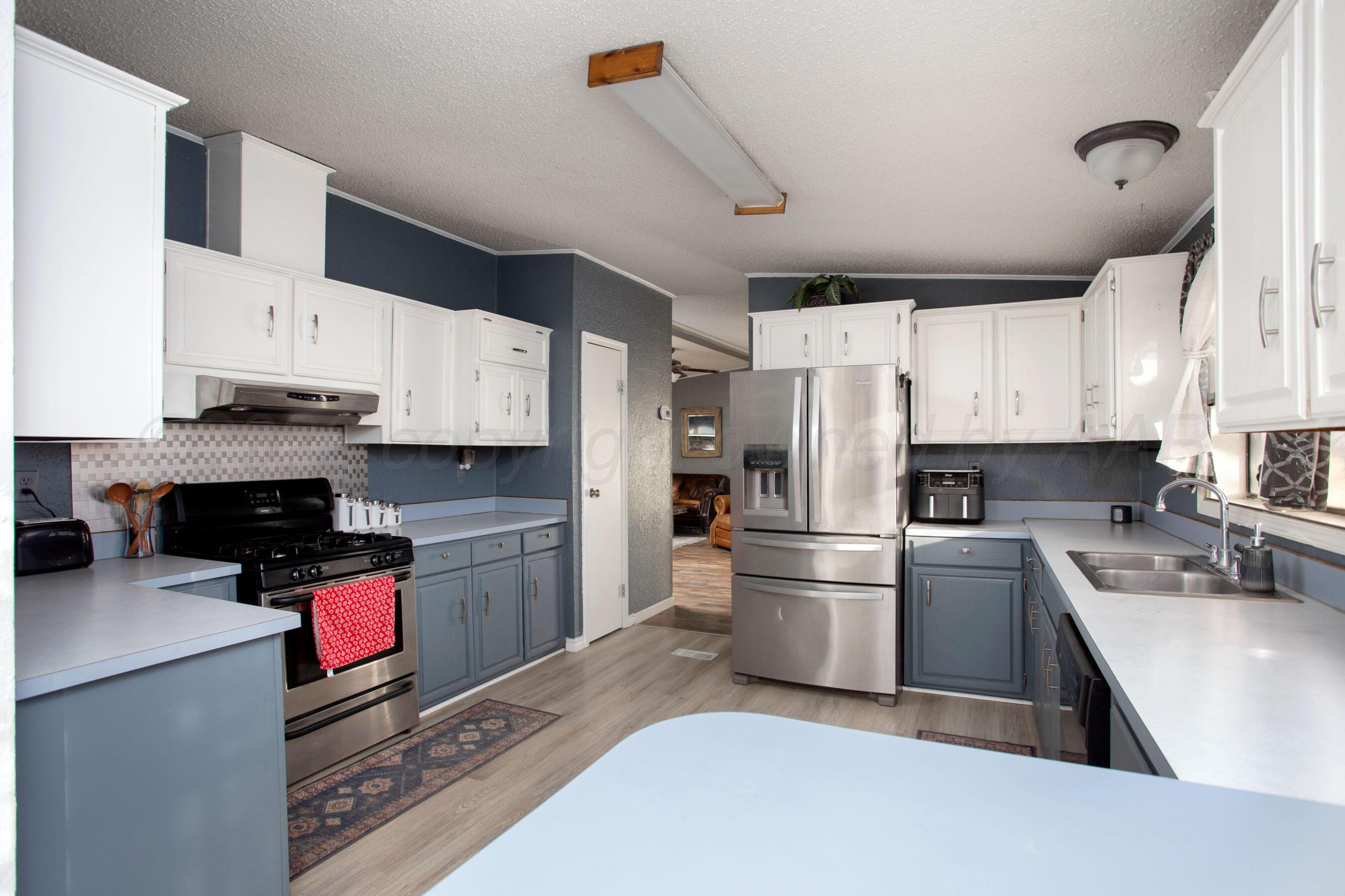 9707 Strawman Trail Amarillo, TX 79108 - Photo 7 of 32 Kitchen