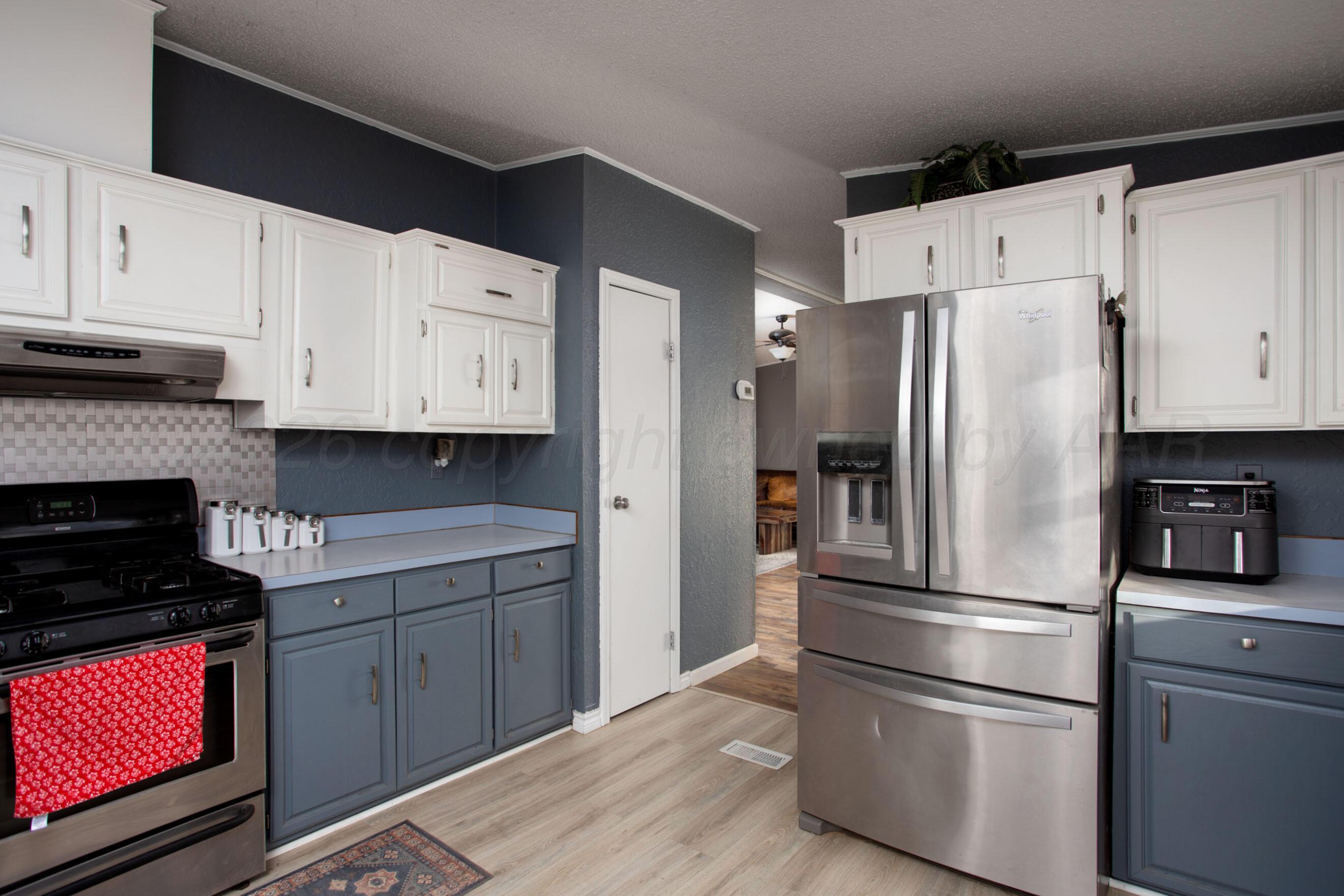 9707 Strawman Trail Amarillo, TX 79108 - Photo 8 of 32 Kitchen