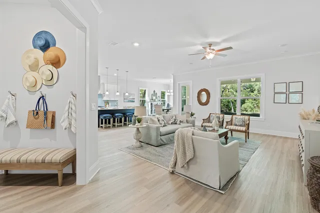 a kitchen with stainless steel appliances white cabinets and a stove top oven