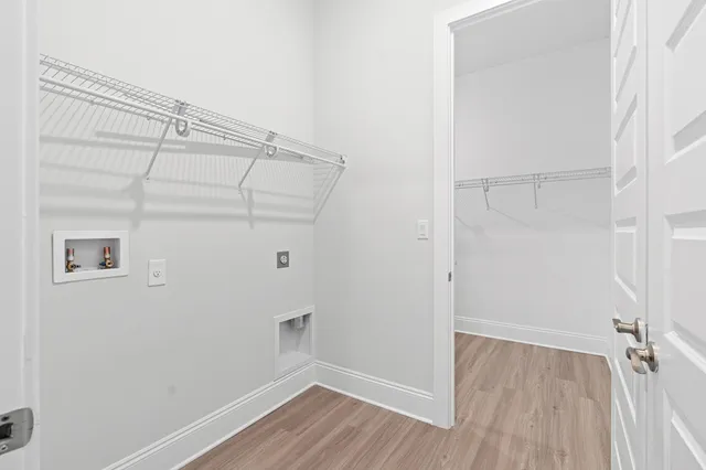 a bathroom with a double vanity sink and mirror