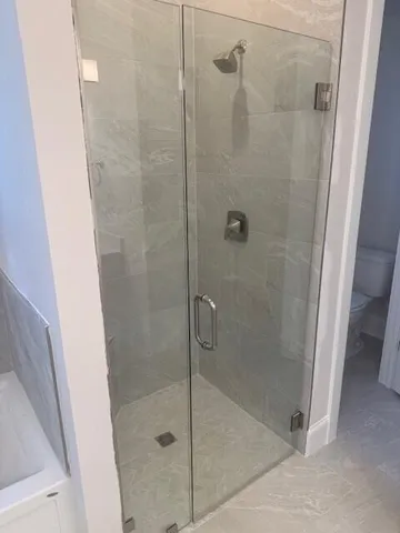 a view of a lake with a big yard