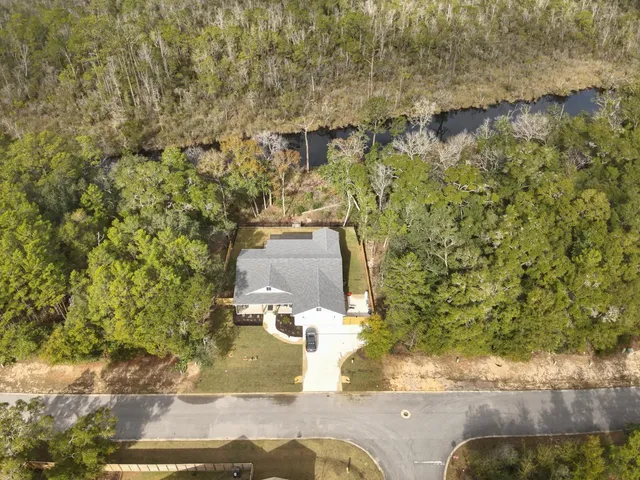 a view of a house with a swimming pool