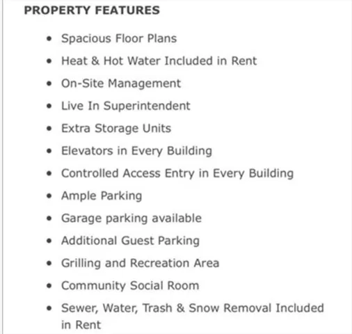 a bedroom with furniture and a washer dryer