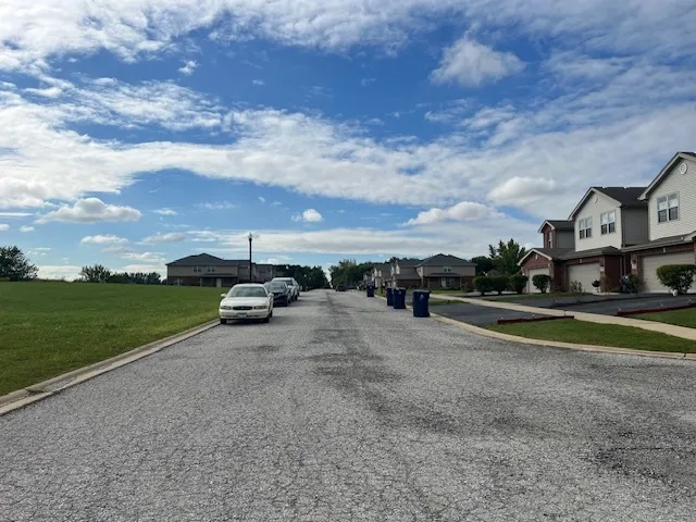 a view of a street with houses