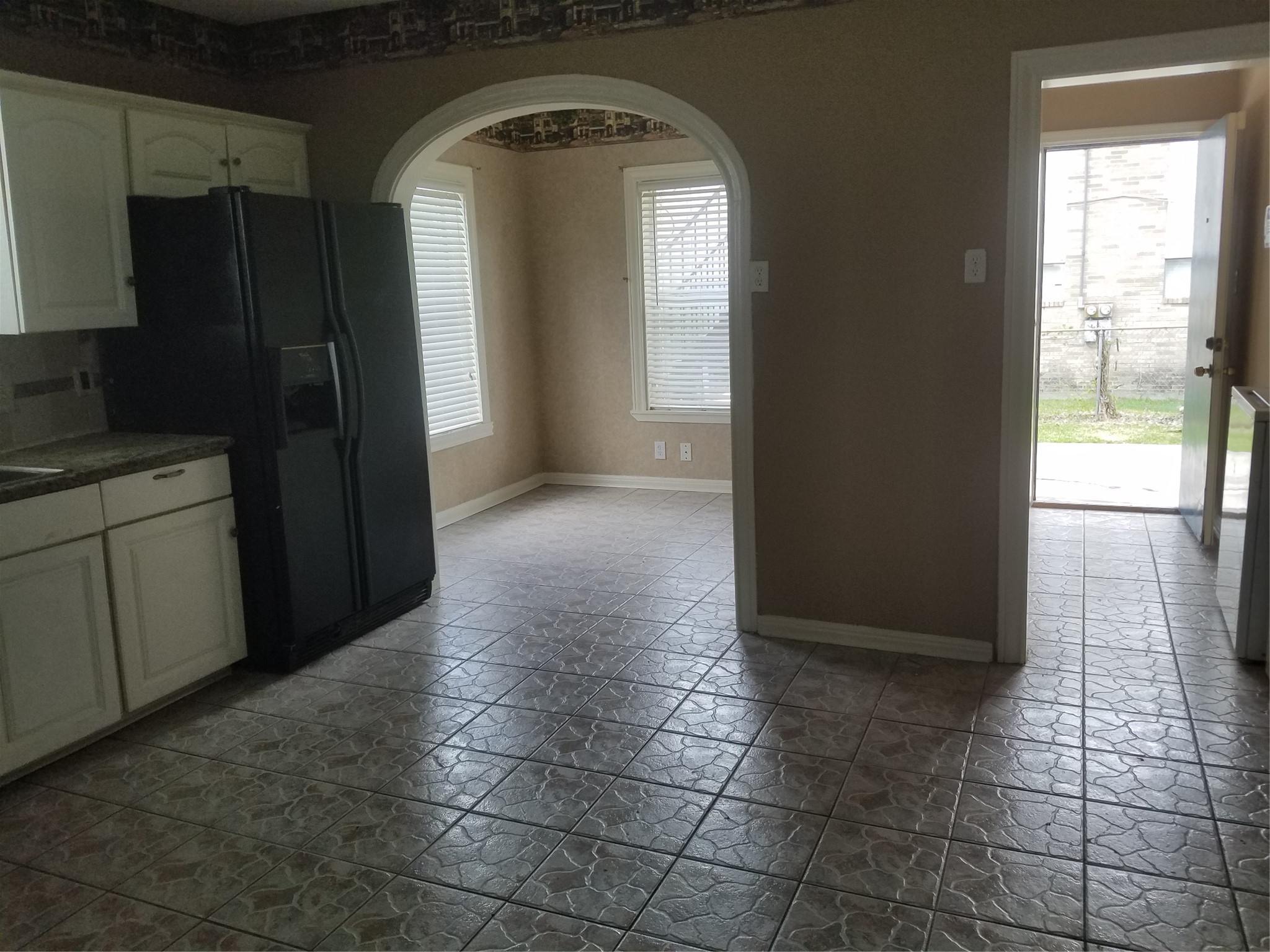 2601 Wheeler Avenue Houston, TX 77004 - Photo 12 of 47 2601 (downstairs) Kitchen, Breakfast Area & Utility Room tile floor