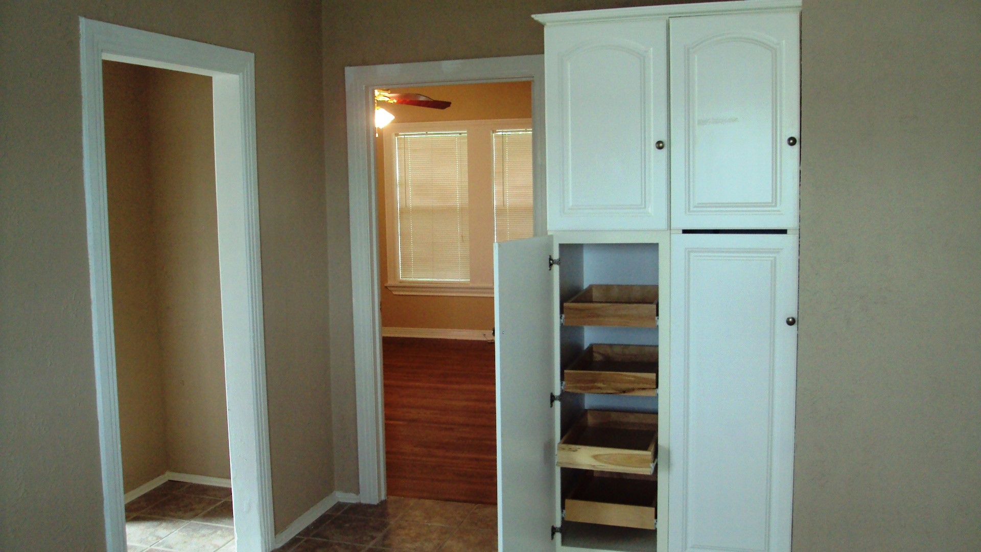 2601 Wheeler Avenue Houston, TX 77004 - Photo 16 of 47 Kitchen pantry has roll-out shelves