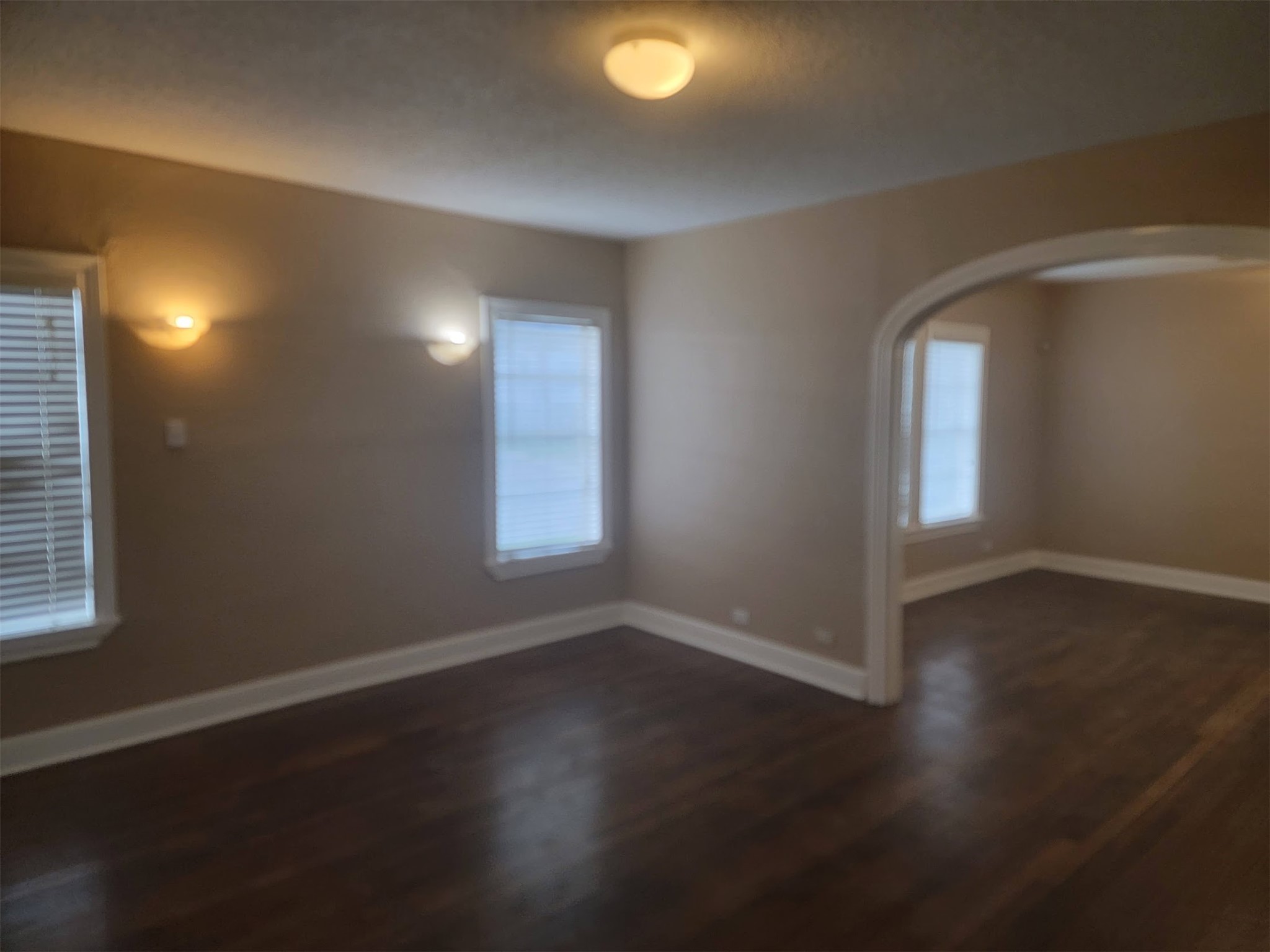 2601 Wheeler Avenue Houston, TX 77004 - Photo 25 of 47 a view of an empty room with wooden floor and a window