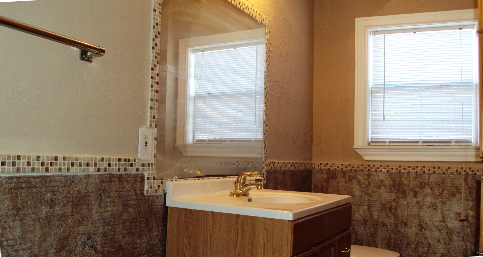 2601 Wheeler Avenue Houston, TX 77004 - Photo 27 of 47 a bathroom with a sink vanity and a mirror