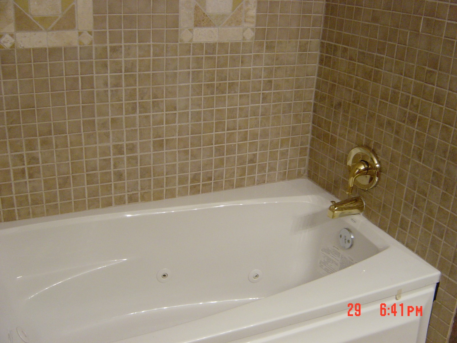 2601 Wheeler Avenue Houston, TX 77004 - Photo 30 of 47 a bath tub sitting next to a white sink and a shower