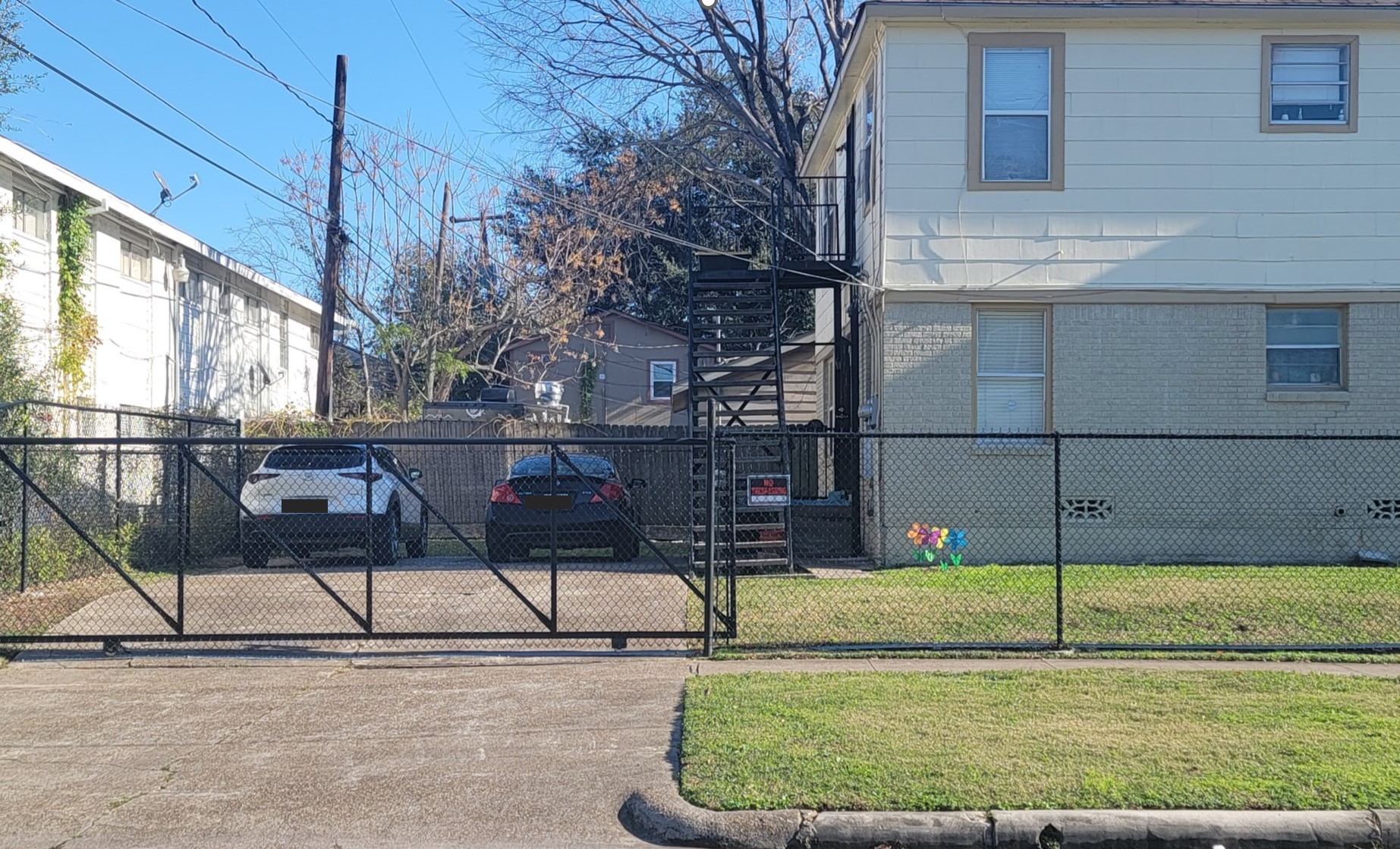 2601 Wheeler Avenue Houston, TX 77004 - Photo 3 of 47 Wrought iron driveway access gate