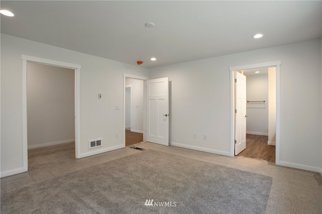 7907 175th Avenue Southwest Rochester, WA 98579 - Photo 23 of 39 a view of an empty room