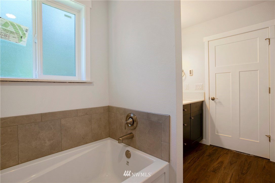 7907 175th Avenue Southwest Rochester, WA 98579 - Photo 25 of 39 a bathroom with a tub and shower