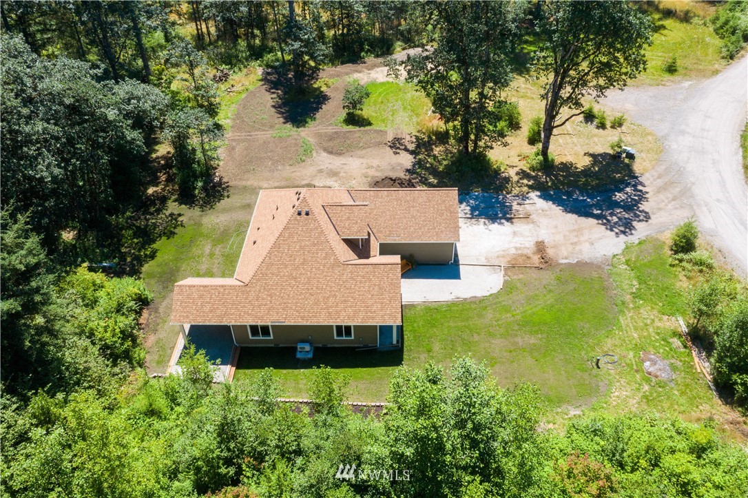7907 175th Avenue Southwest Rochester, WA 98579 - Photo 38 of 39 an aerial view of a house with yard swimming pool and outdoor seating