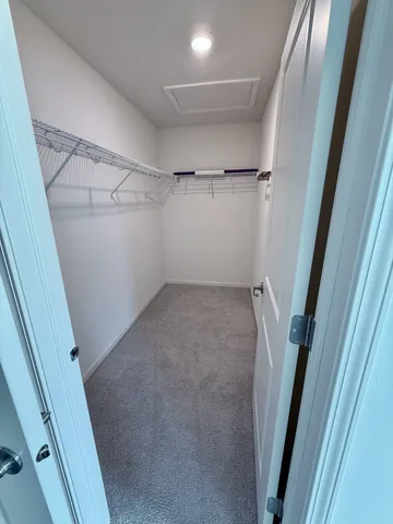 a view of a room with racks on the wall