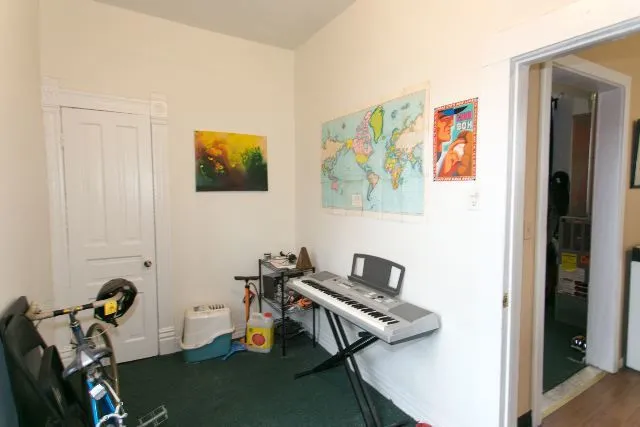 a room with furniture and air hockey table