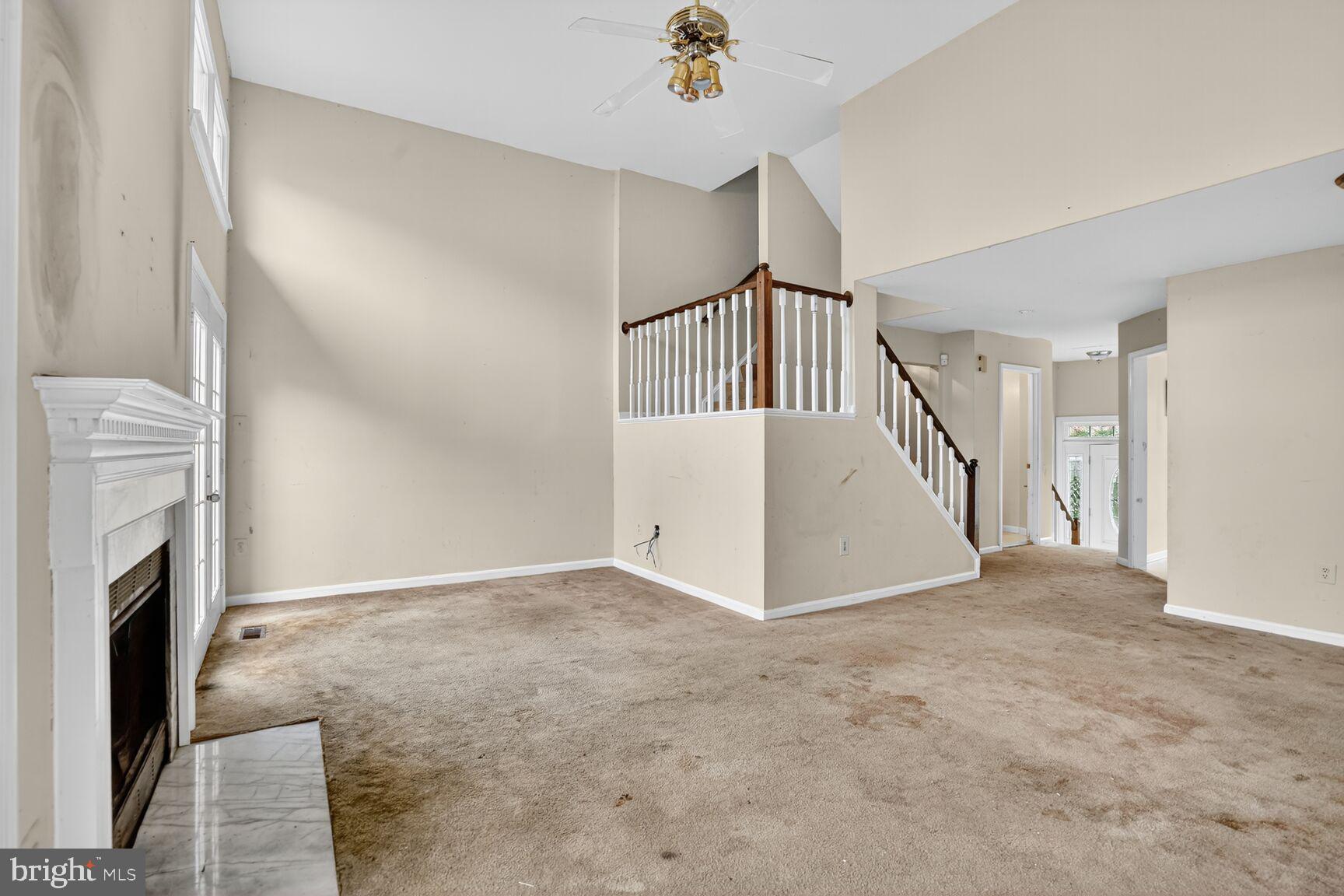 13920 Baton Rouge Court Centreville, VA 20121 - Photo 11 of 24 a view of an empty room with a fireplace