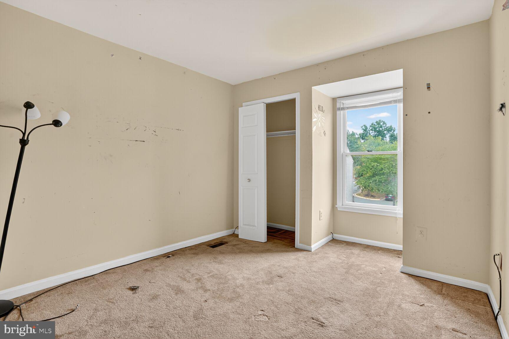 13920 Baton Rouge Court Centreville, VA 20121 - Photo 19 of 24 a view of an empty room with a window