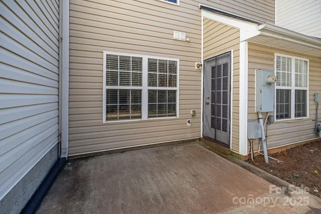 a view of a house with a large window
