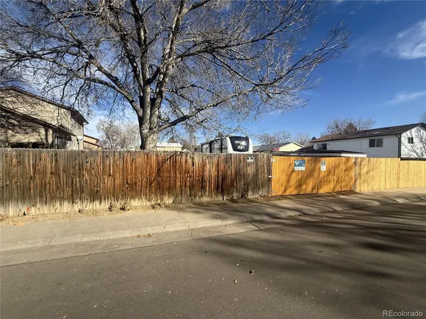 a view of outdoor space and car parked