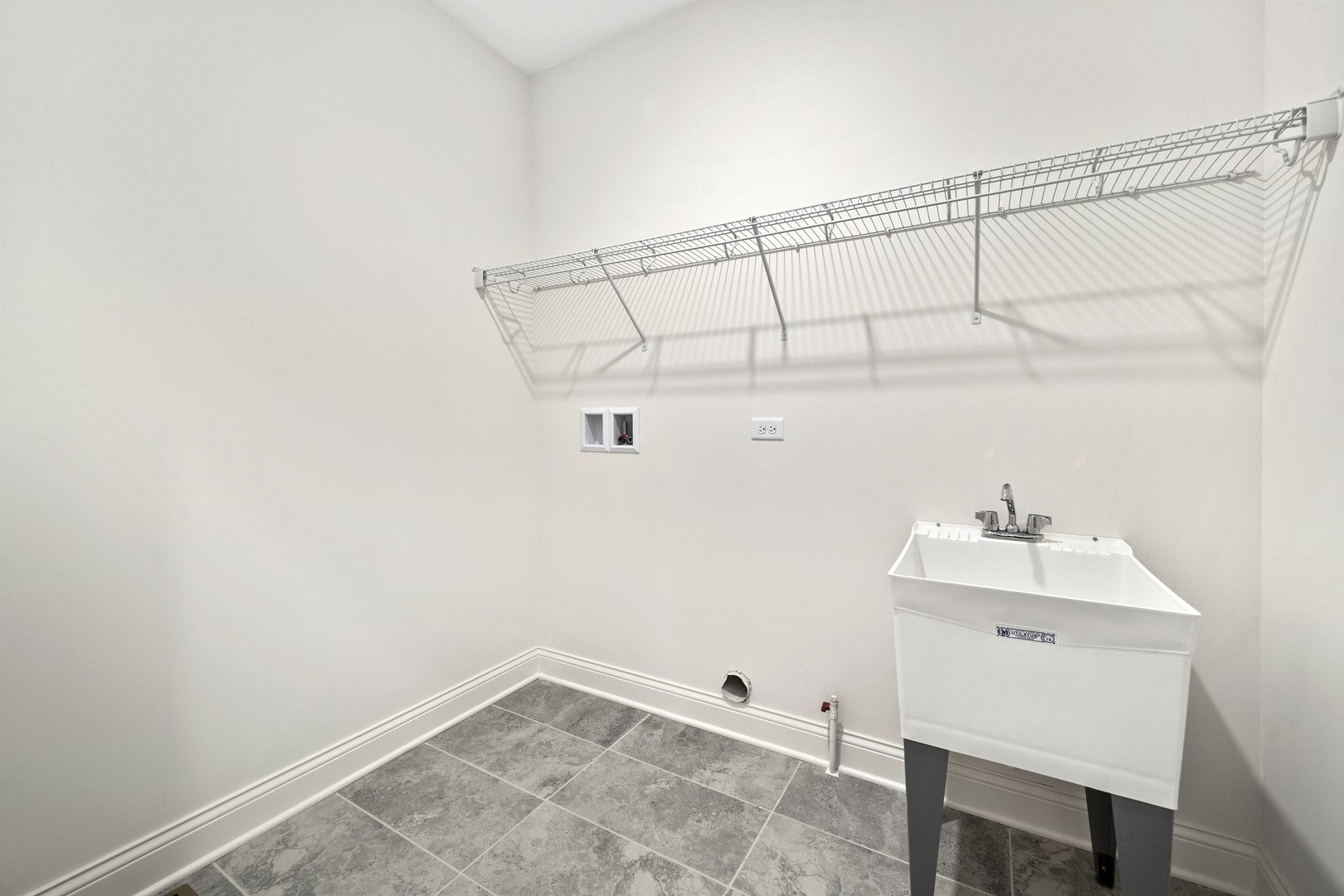 1879 Chandolin Lane Elgin, IL 60124 - Photo 15 of 24 a view of a room with racks on the wall