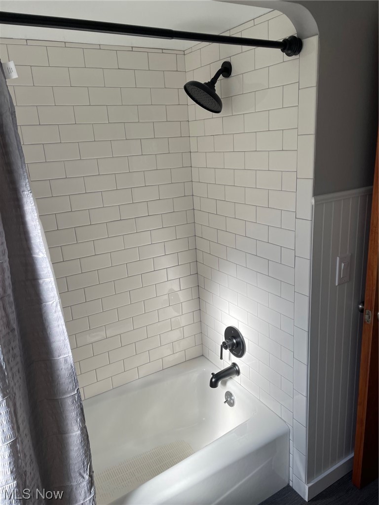 5972 Crossview Road Independence, OH 44131 - Photo 10 of 33 Bathroom featuring shower / bath combo with shower curtain