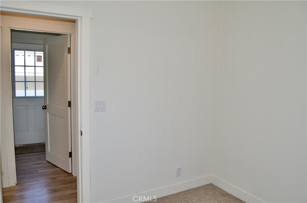 1226 Main Street, Unit 31 Cambria, CA 93428 - Photo 29 of 52 a view of a room with wooden floor
