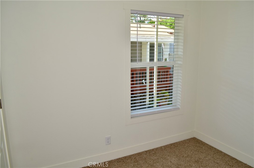 1226 Main Street, Unit 31 Cambria, CA 93428 - Photo 36 of 52 an empty room with a window