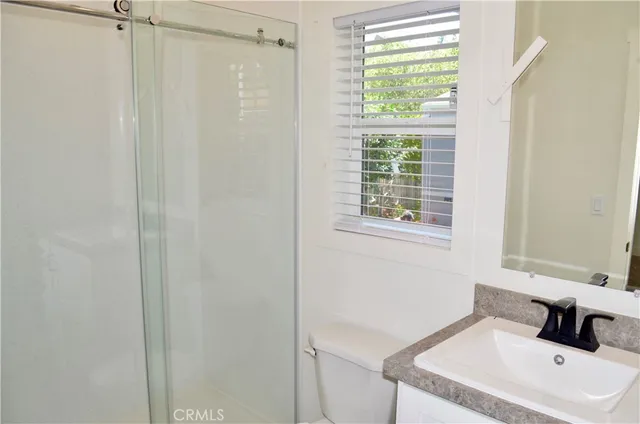 a bathroom with a sink toilet and tub