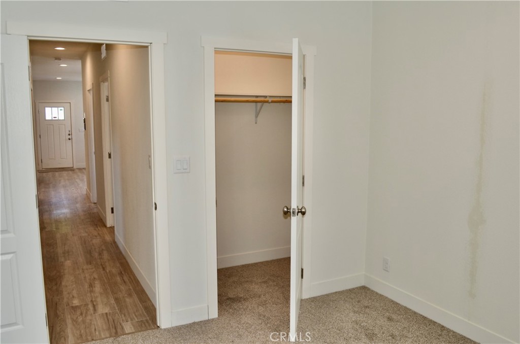 1226 Main Street, Unit 31 Cambria, CA 93428 - Photo 47 of 52 a view of a room with wooden floor