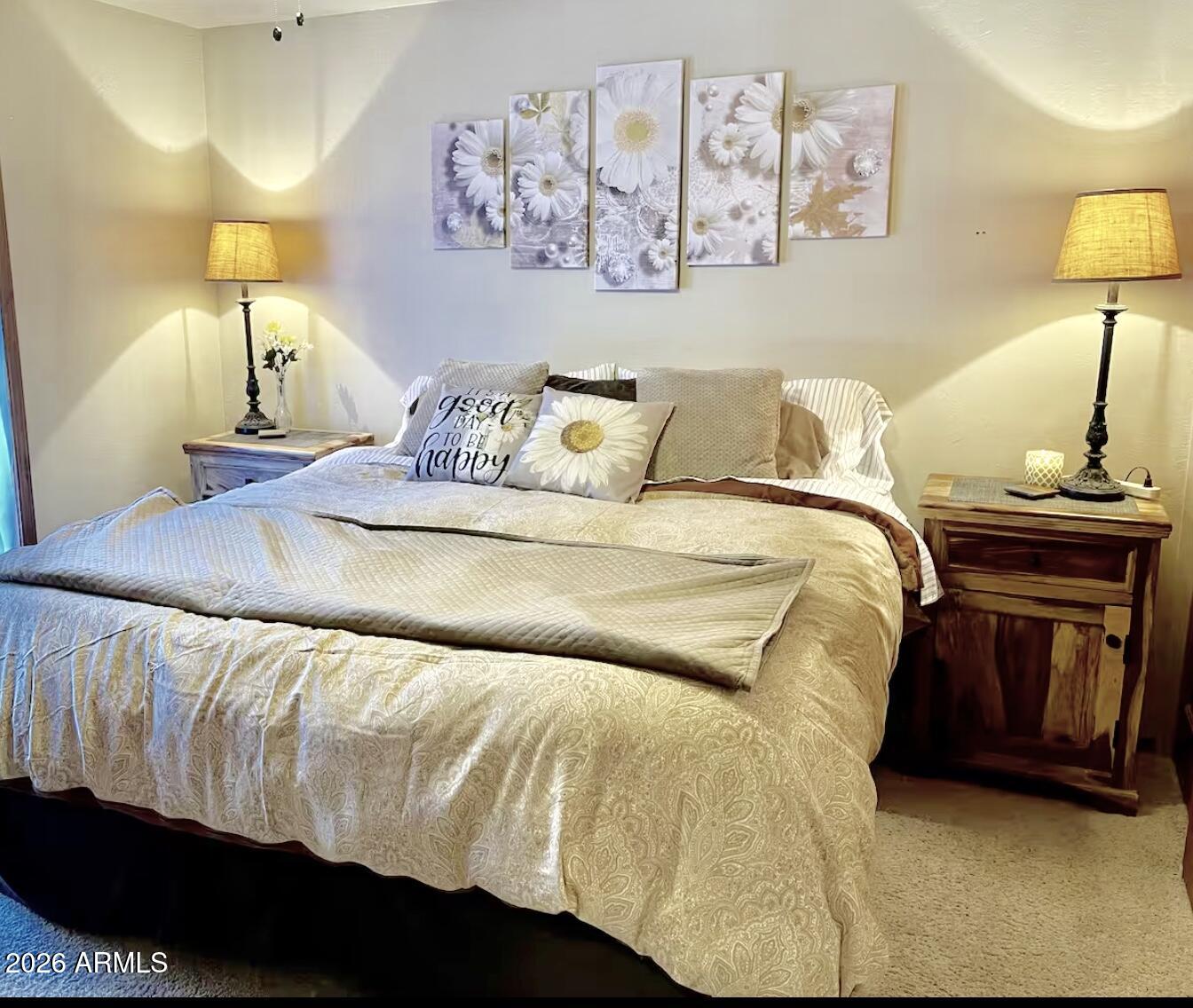 2644 Lodge Loop Overgaard, AZ 85933 - Photo 18 of 34 a bed sitting in a bedroom next to a lamp