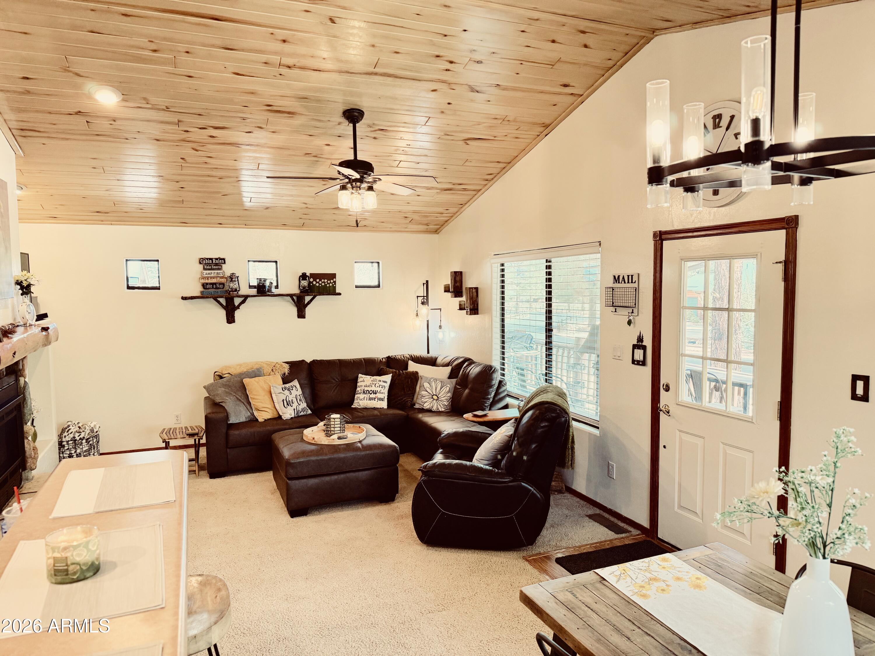 2644 Lodge Loop Overgaard, AZ 85933 - Photo 6 of 34 a living room with furniture